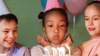 Children celebrating a birthday party at Cantref Adventure Farm
